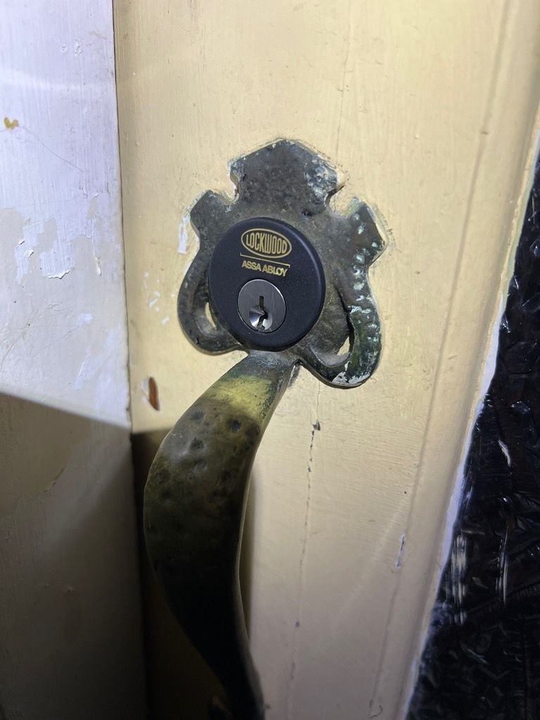 Close-up of a Lockwood Deadlatch Barrel installed on a door