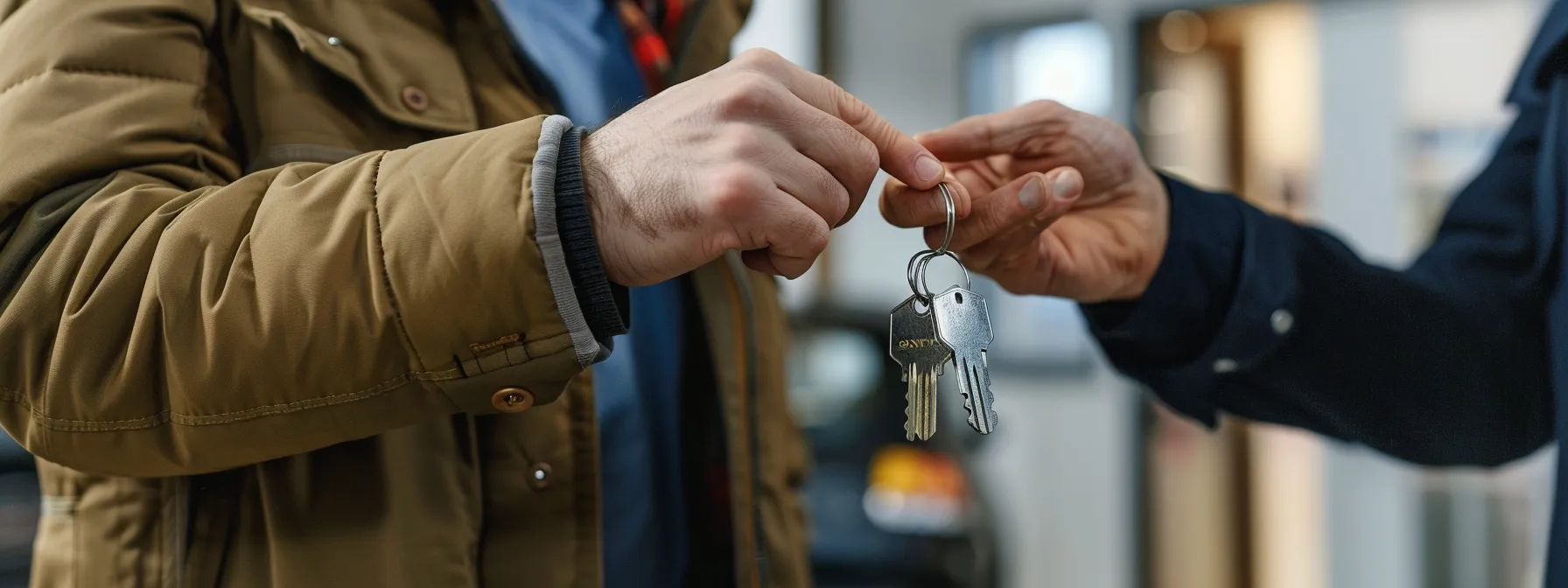 a locksmith holding a master key system chart and discussing security protocols with a business owner.